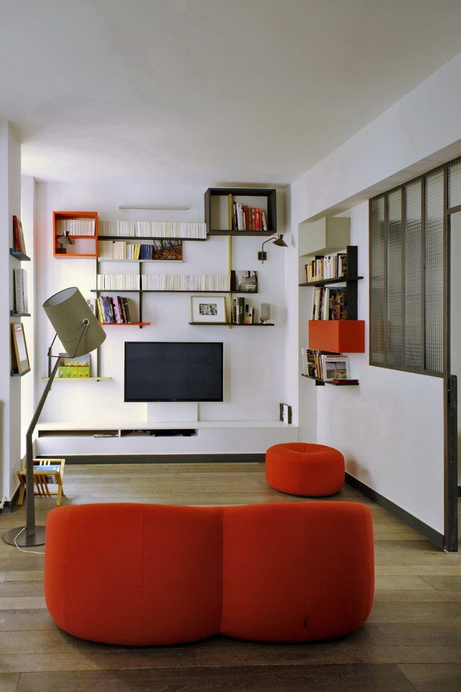 Ligne Roset Nyc for a Eclectic Living Room with a Red Round Couch and Temple by Moc, Maisons Objets & Chantiers