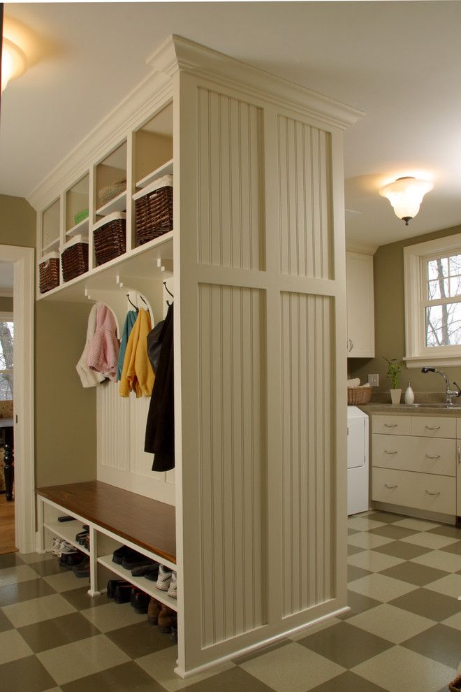 Linoleum vs Vinyl for a Farmhouse Entry with a Laundry Room and Combination Mudroom and Laundry Room by Ron Brenner Architects