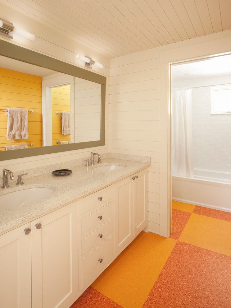 Linoleum vs Vinyl for a Traditional Bathroom with a Bathroom Mirror and Guest Bathroom by Whitten Architects