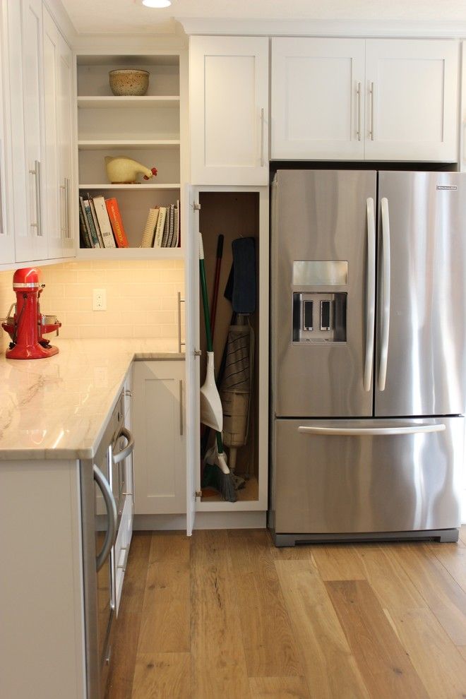 Lockwood Flooring for a Transitional Kitchen with a Subway Tile and Bettendorf, Ia  Kitchen Remodel with Interesting Angled Layout by Village Home Stores