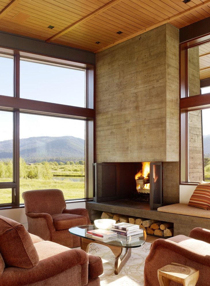 Loewen Windows for a Modern Living Room with a Brown Armchair and Indian Springs Ranch Residence by Carney Logan Burke Architects