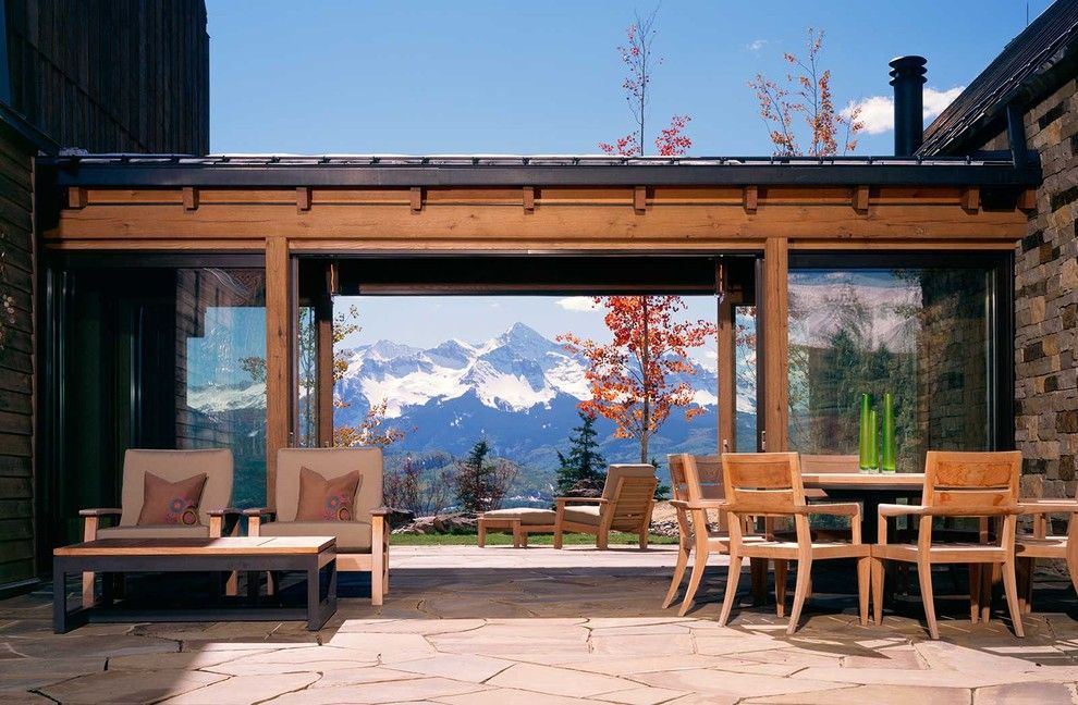 Loewen Windows for a Rustic Patio with a Two Sided Patio and Wilson Mountain Residence by Poss Architecture + Planning + Interior Design