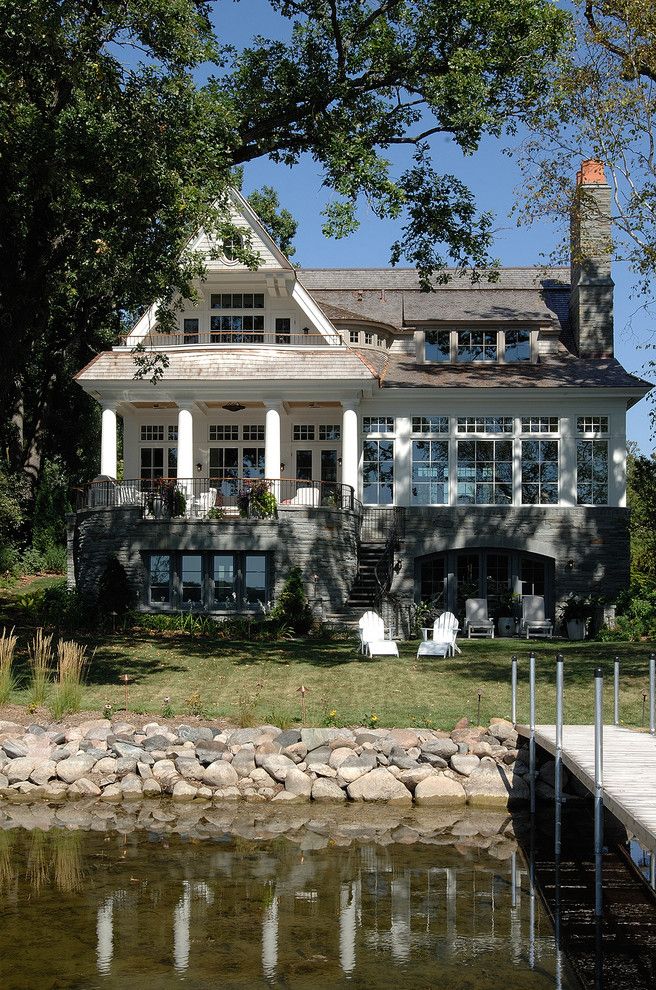 Loewen Windows for a Victorian Exterior with a Shake Roof and Minnetonka Shingle Style by Tea2 Architects