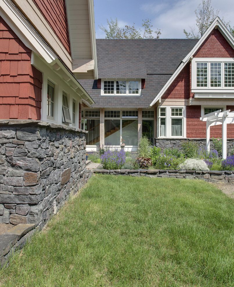 Loewen Windows for a Victorian Exterior with a Shingle Siding and Lake Superior Residence by Tea2 Architects