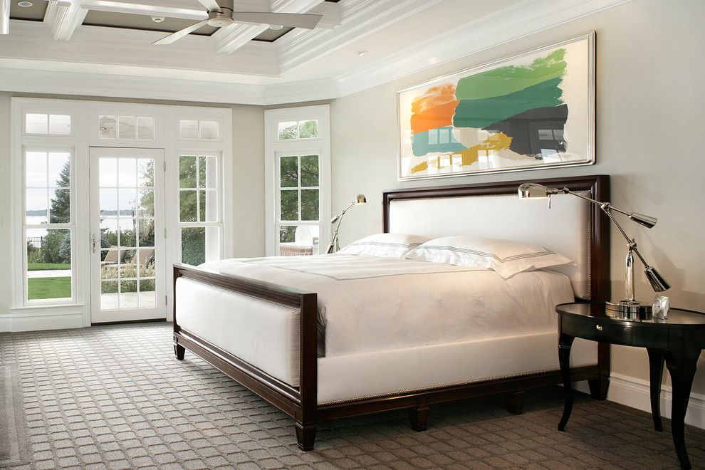 Low Pile Carpet for a Traditional Bedroom with a Dark Wood Bed and Monmouth Beach House by I.fromkin Interiors