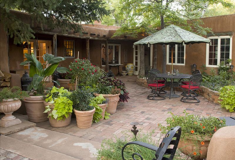 Lowes Albuquerque for a Mediterranean Patio with a Brick Paving and Lush Downtown Patio by Clemens & Associates Inc.