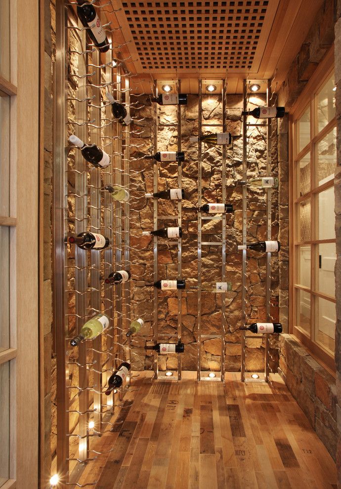 Lowes Metairie for a Beach Style Wine Cellar with a Built in Storage and Bayshores Drive by Brandon Architects, Inc.