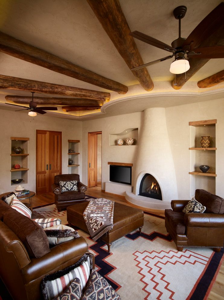 Lowes Santa Fe for a Southwestern Family Room with a Wood Floor and Oshweken by Harvest House Craftsmen