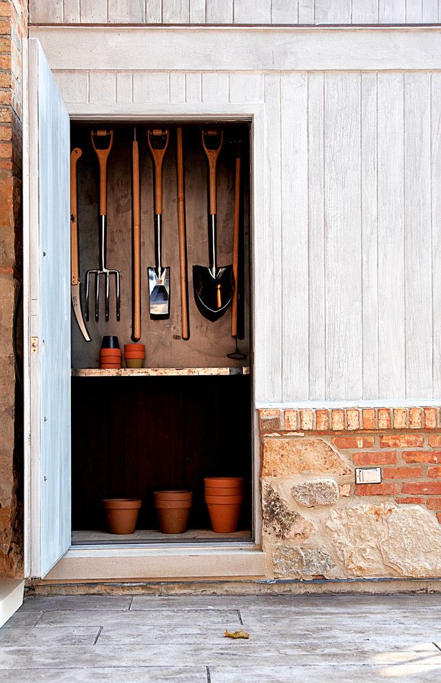 Lowes Tool Rental for a Rustic Shed with a Brick Exterior and Garden Shed by Mark Hickman Homes