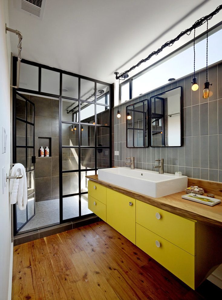 Lowes Yuma Az for a Industrial Bathroom with a Yellow Cabinets and San Francisco Floating House by Robert Nebolon Architects