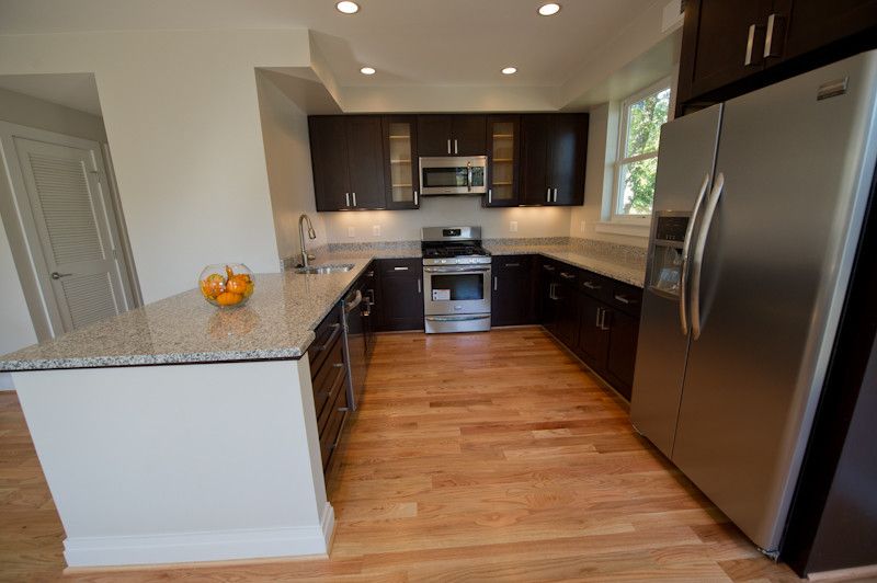 Luna Pearl Granite for a Traditional Kitchen with a Open and Dc Townhouse Renovation by Urban7properties