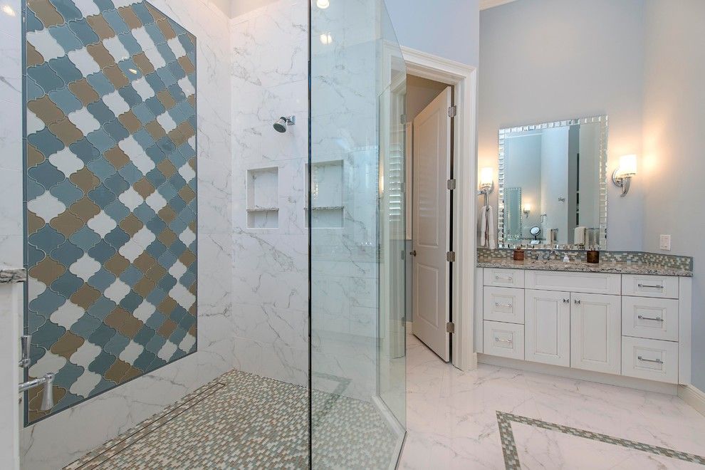 Lykos for a Traditional Spaces with a Master Bath and Master Bath   Royal Harbor by the Lykos Group, Inc.