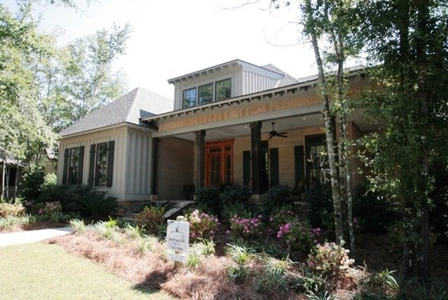 Malouf Furniture for a Traditional Exterior with a Natural Wood Finish and 2010 Parade Home by Bob Chatham Custom Home Design