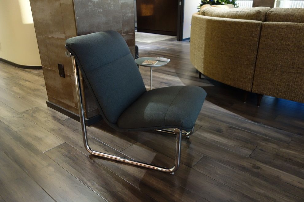 Mannington Commercial for a Modern Living Room with a Modern Chair and Tulsa High Rise Remodel by Tulsa Design Therapy