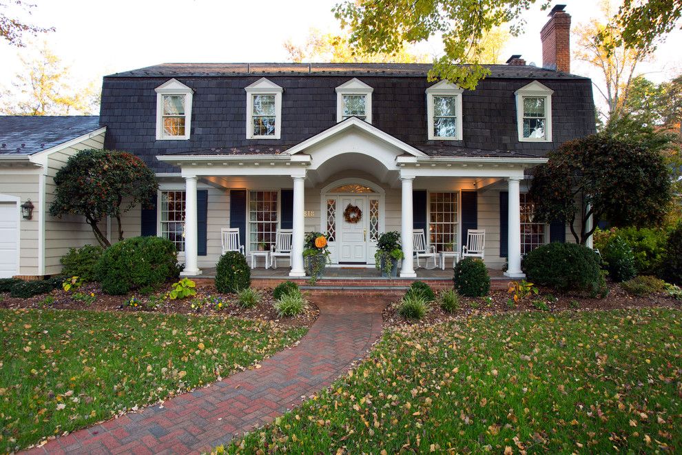 Mansard Roof for a Traditional Exterior with a Dentil Moulding and House with River Views by Christine Kelly / Crafted Architecture