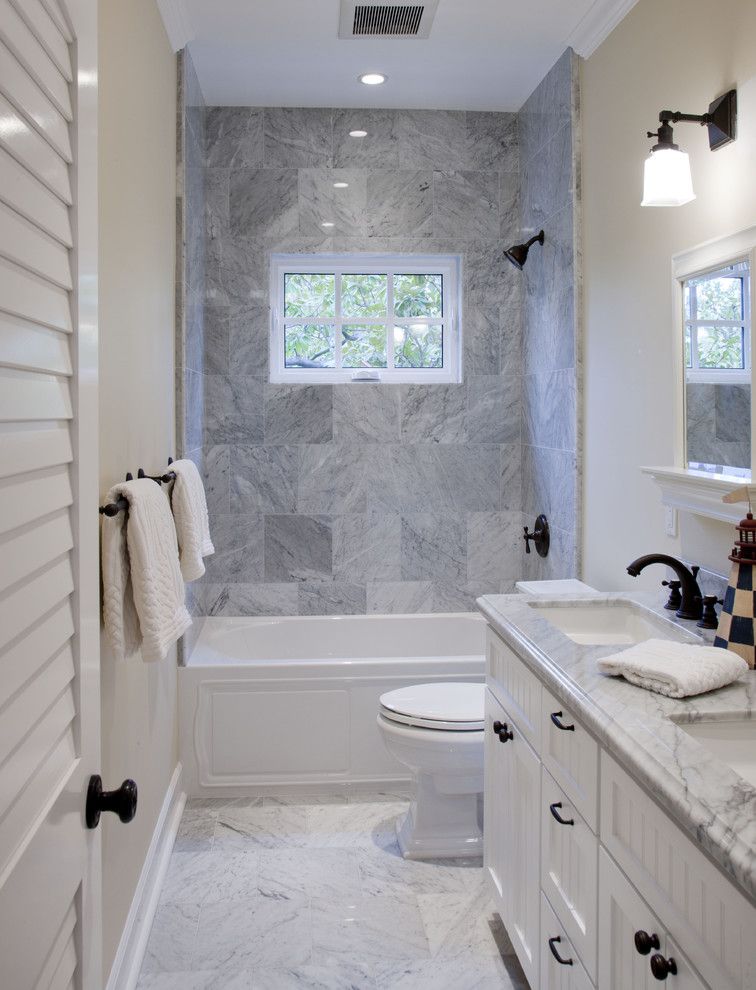 Marble Institute of America for a Beach Style Bathroom with a Marble and America's Cup Bathroom by Flagg Coastal Homes