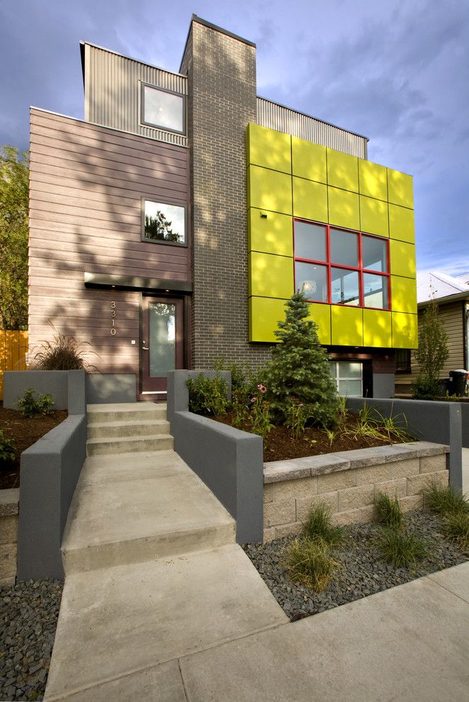 Marlette Homes for a Modern Exterior with a Gray Concrete Wall and Green Cube   Leed Platinum Showhome by Re.dzine