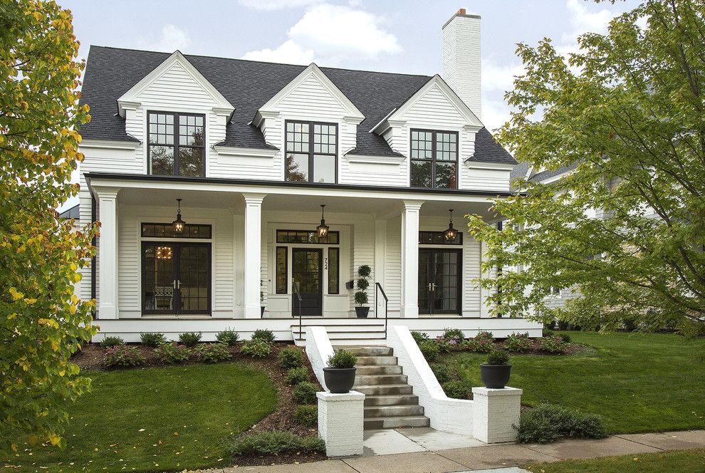 Marvin Integrity for a Transitional Exterior with a Porch and Modern Colonial Four Square by Charlie & Co. Design, Ltd