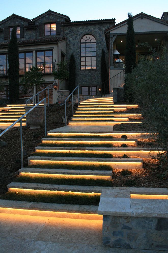 Matthews Building Supply for a Mediterranean Landscape with a Wallstone and Showcase Project   Natural Stone Lit Steps by Sbi Building Materials & Landscape Supplies