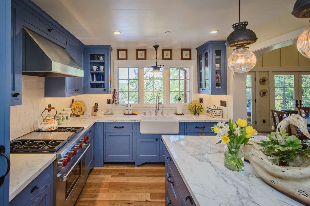 Mayer Lighting for a Farmhouse Kitchen with a Storybook and Custom Built Storybook Home in Orinda by Blueline Custom Builders