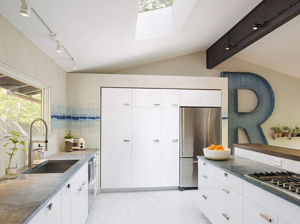 Mcelroy Metal for a Midcentury Kitchen with a Kitchen with Skylight and Upper Main Line Residence by Studiorobert Jamieson