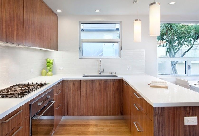 Mcelroy Metal for a Midcentury Kitchen with a Walnut Veneer and Mid Century Remodel by Knocknock