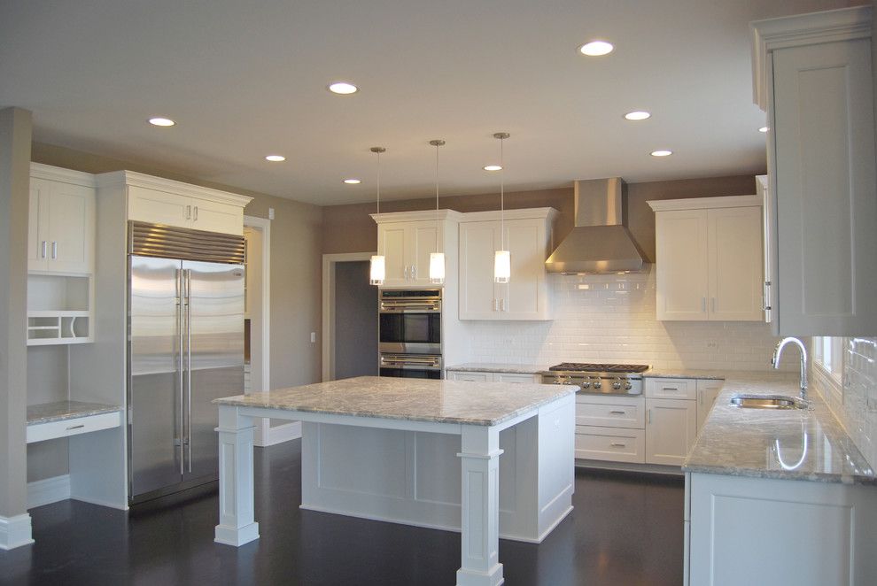 Mega Granite for a Traditional Kitchen with a Island and Custom 211aps by King's Court Builders, Inc.