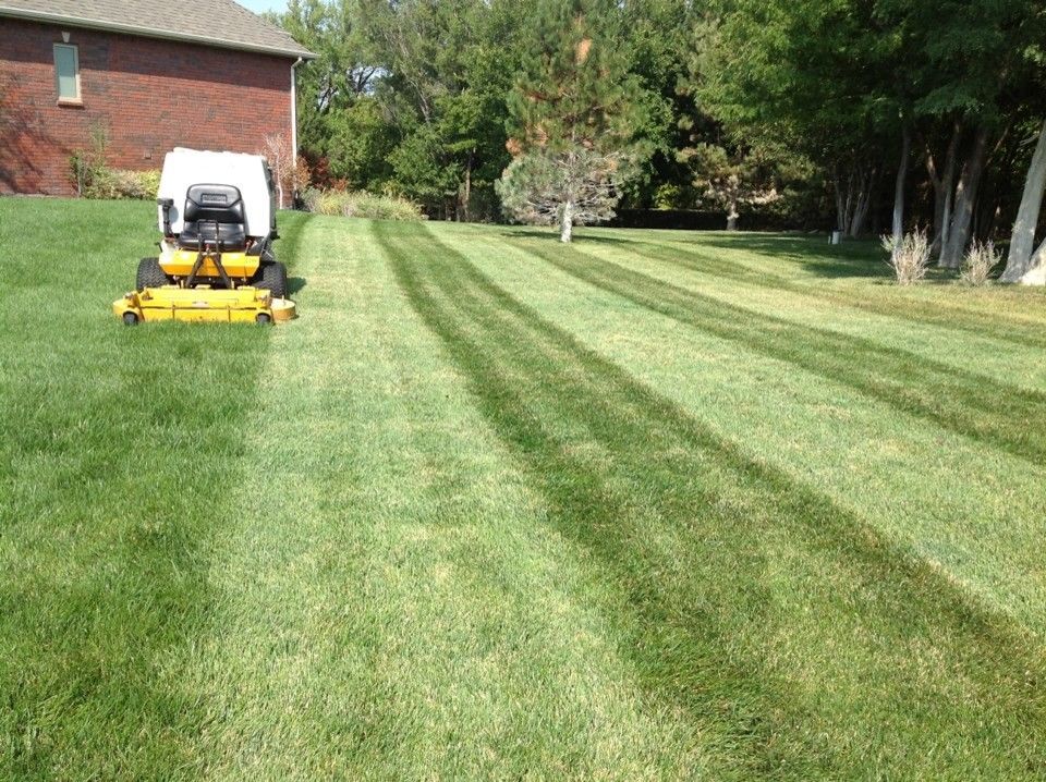 Menards Wichita Kansas for a  Exterior with a Lawn Care and Lawn Care Service   Mowing Services | Wichita, Kansas by Daniels Lawn and Landscaping Services