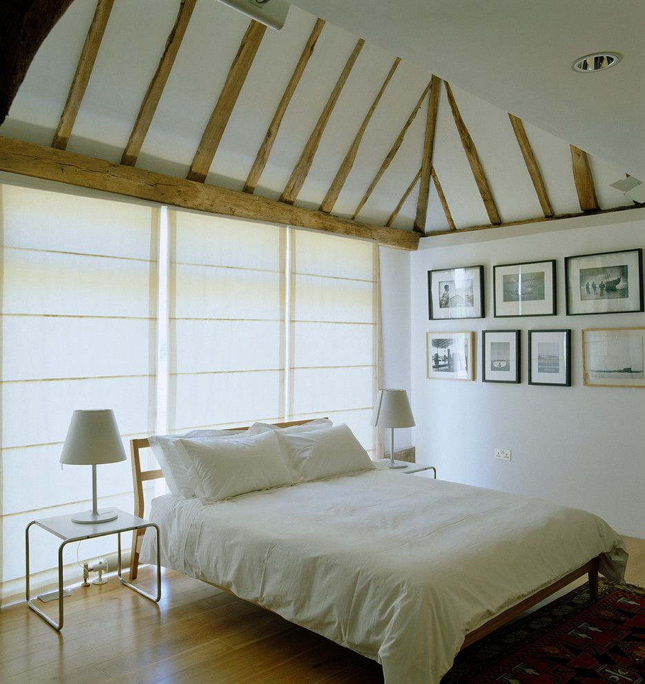 Mens Bedroom Ideas for a Farmhouse Bedroom with a Window Wall and Saling Barn by Pocknell Studio