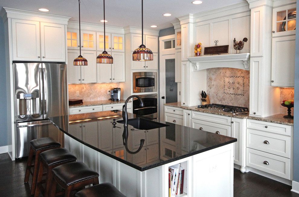 Mid Continent Cabinetry for a Eclectic Kitchen with a Granite Countertop and Hudsonville Home with Midcontinent Cabinetry by Starlite Kitchens and Baths