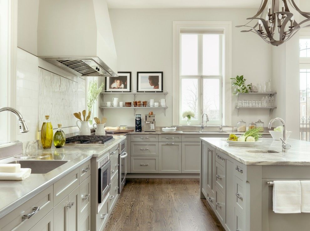 Mid Continent Cabinets for a Traditional Kitchen with a Marble Countertop and Kitchen Renovation in Lafayette Square by Mitchell Wall Architecture & Design