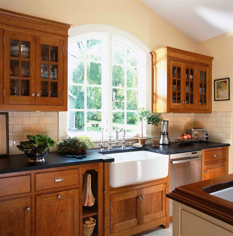 Mid Continent Cabinets for a Victorian Kitchen with a Black Countertop and Ireland in Ct by Christine Donner Kitchen Design Inc.