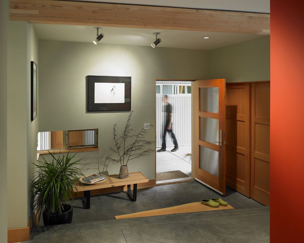 Mirage Flooring for a Contemporary Entry with a Corner Window and Vashon Residence Entry by Goforth Gill Architects