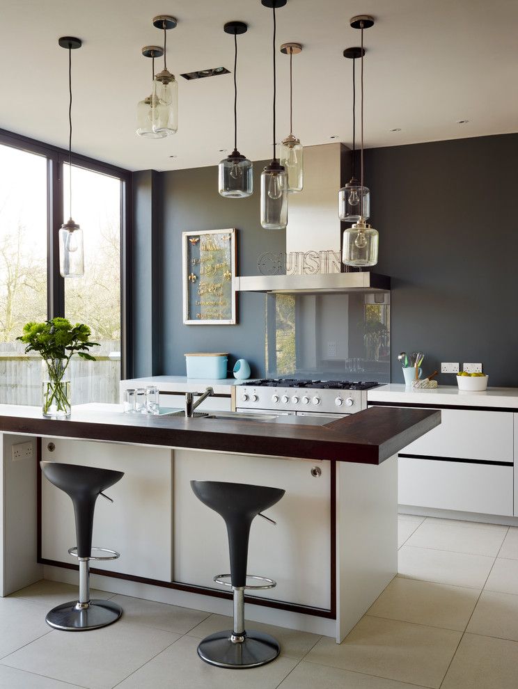 M&m Lighting for a Contemporary Kitchen with a Matt Lacquer White Kitchen and Roundhouse Contemporary Kitchens by Roundhouse