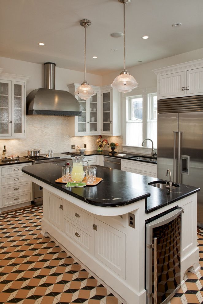 M&m Lighting for a Traditional Kitchen with a Floor Tile and Austin Texas Residence by Voh Architects