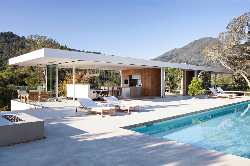 Modern Cabana for a Contemporary Patio with a Outdoor Chaise Lounge and Fleetwood Distinguished Photos by Fleetwood Windows & Doors