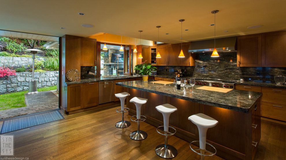 Modern Mobler for a Contemporary Kitchen with a Breakfast Bar and Pushing the Envelope by Synthesis Design Inc.