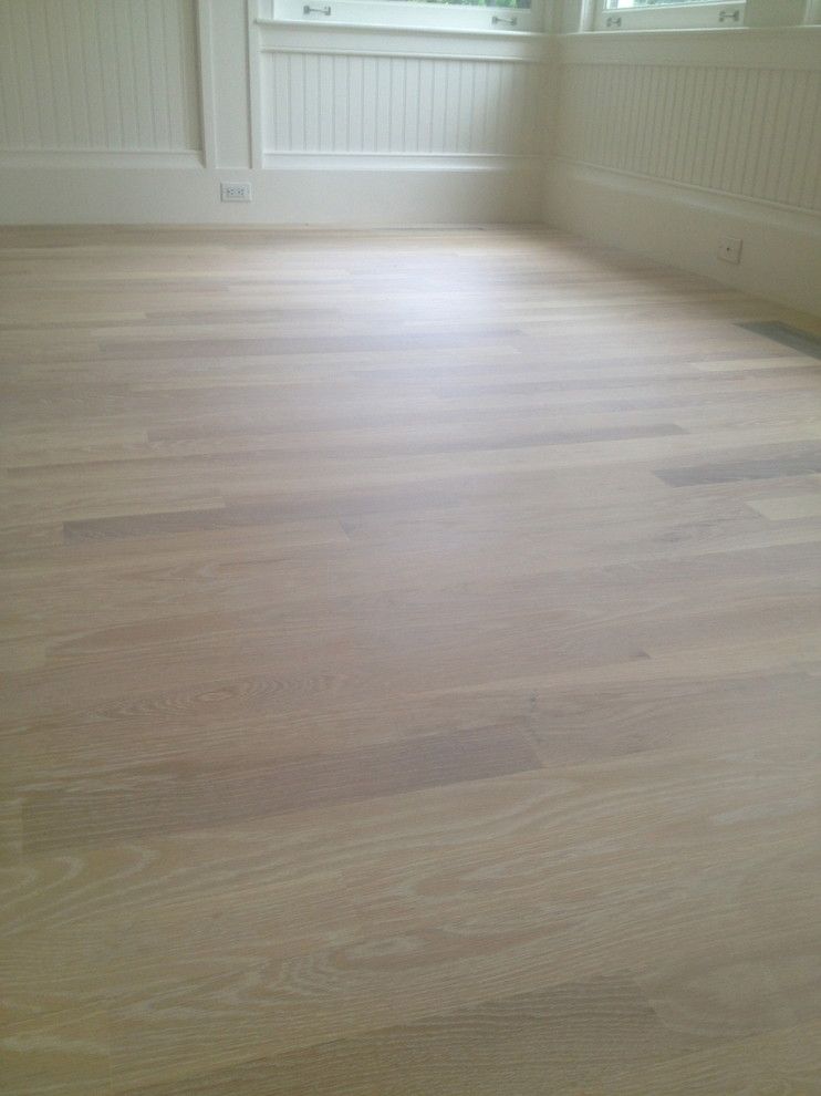 Monocoat for a Contemporary Spaces with a White Floor and Rubio Monocoat Cotton White by Eco Options Hardwood