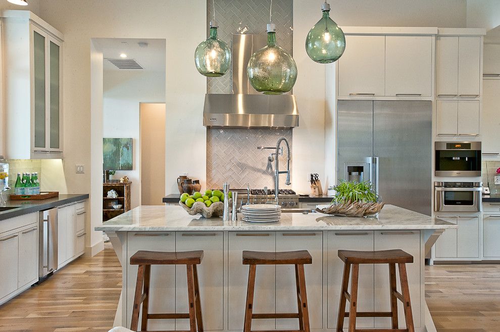 Mont Granite for a Transitional Kitchen with a Stainless Steel Appliances and Cat Mountain Residence by Cornerstone Architects