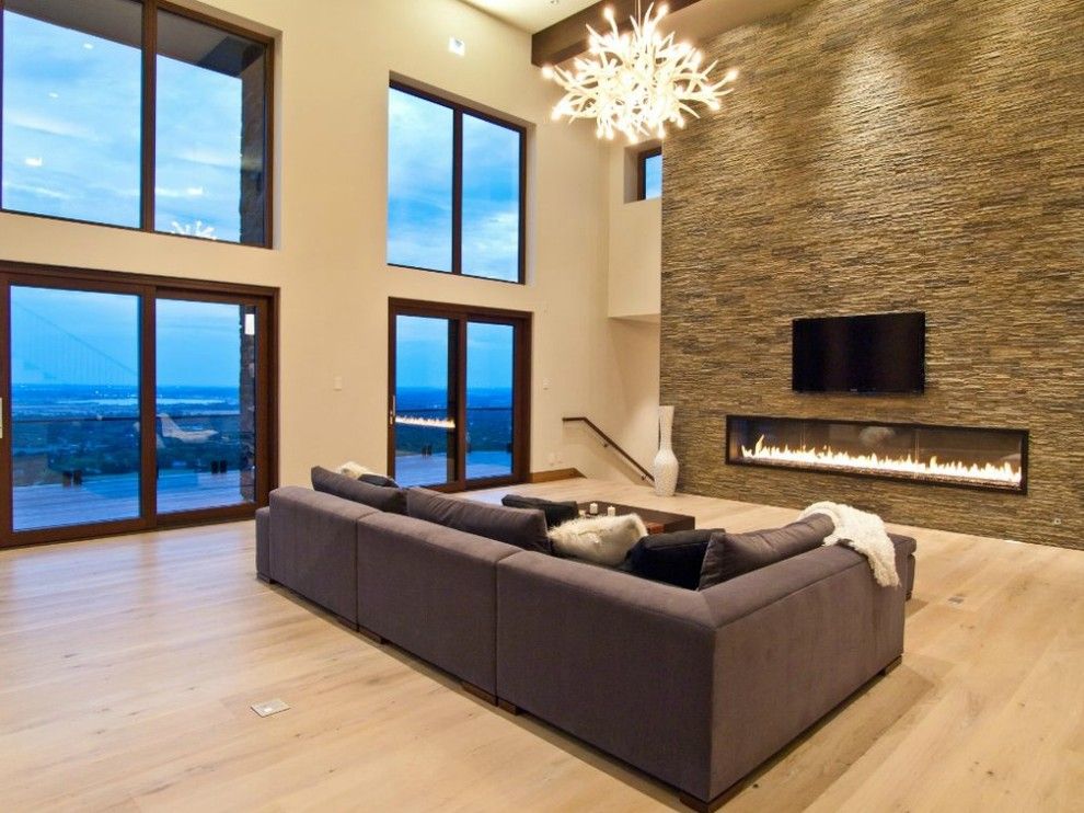 Montigo for a Contemporary Living Room with a Television and 10' Custom Gas Fireplace by Montigo Fireplaces