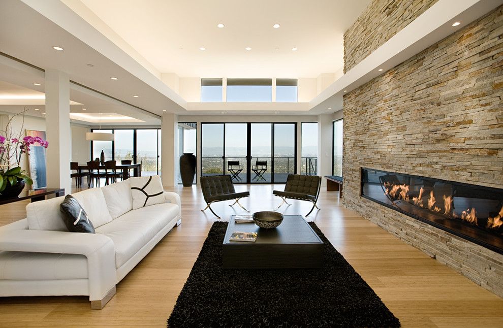 Montigo for a Modern Living Room with a Big Window and 10' Custom Gas Fireplace by Montigo Fireplaces