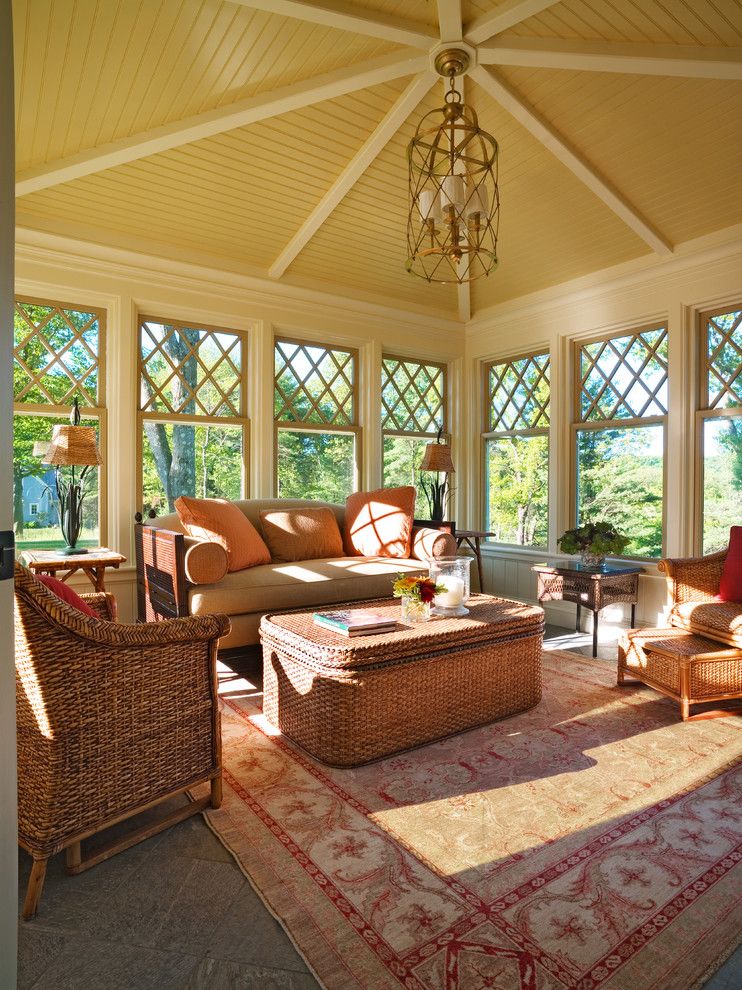 Mor Furniture for a Victorian Sunroom with a Caged Chandelier and Sitting Room by Hart Associates Architects, Inc.