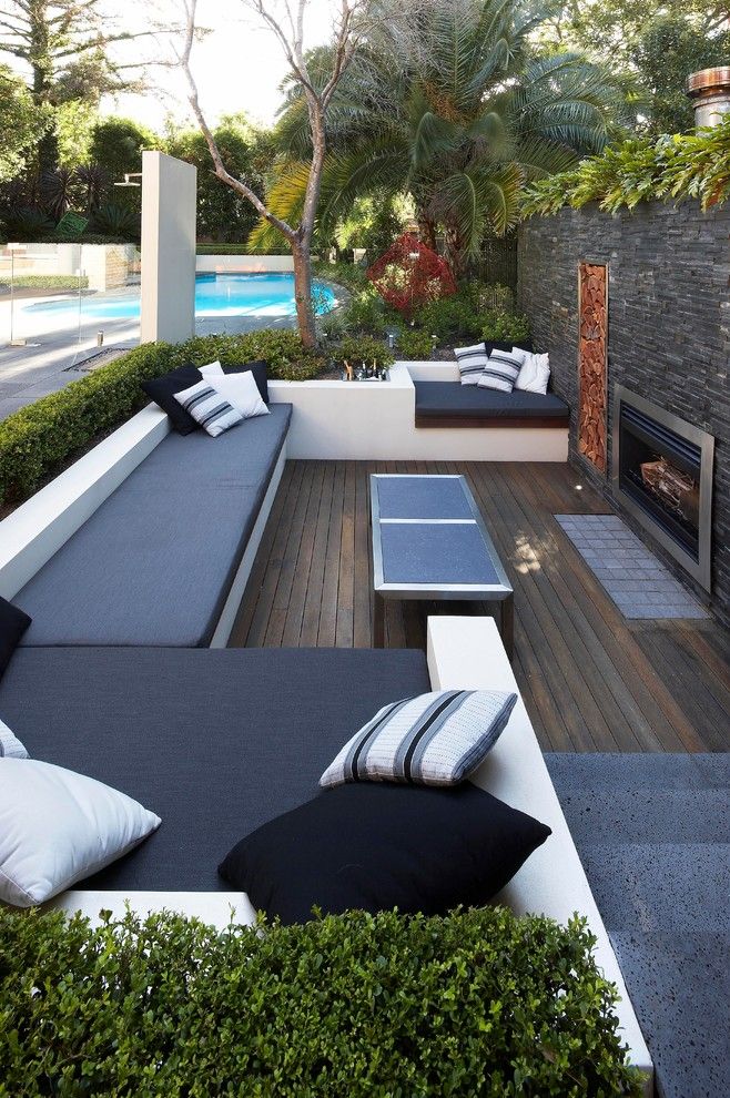 Mor Furniture for Less for a Contemporary Patio with a Fireplace and Sunken Connections by Dean Herald Rolling Stone Landscapes