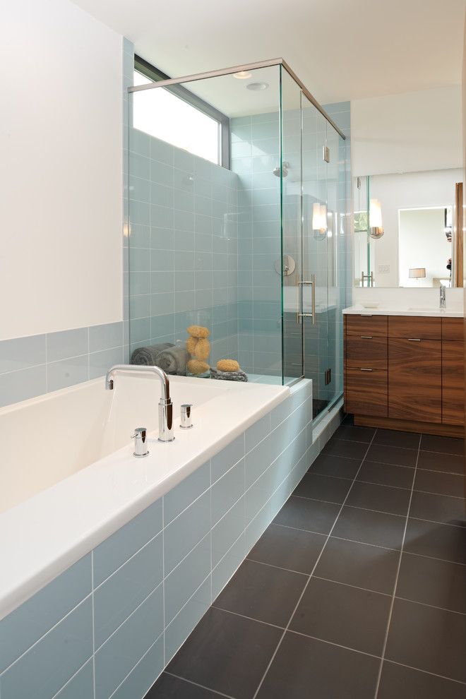 Mosa Tile for a Modern Bathroom with a Clerestory and Bathroom by Citydeskstudio, Inc.