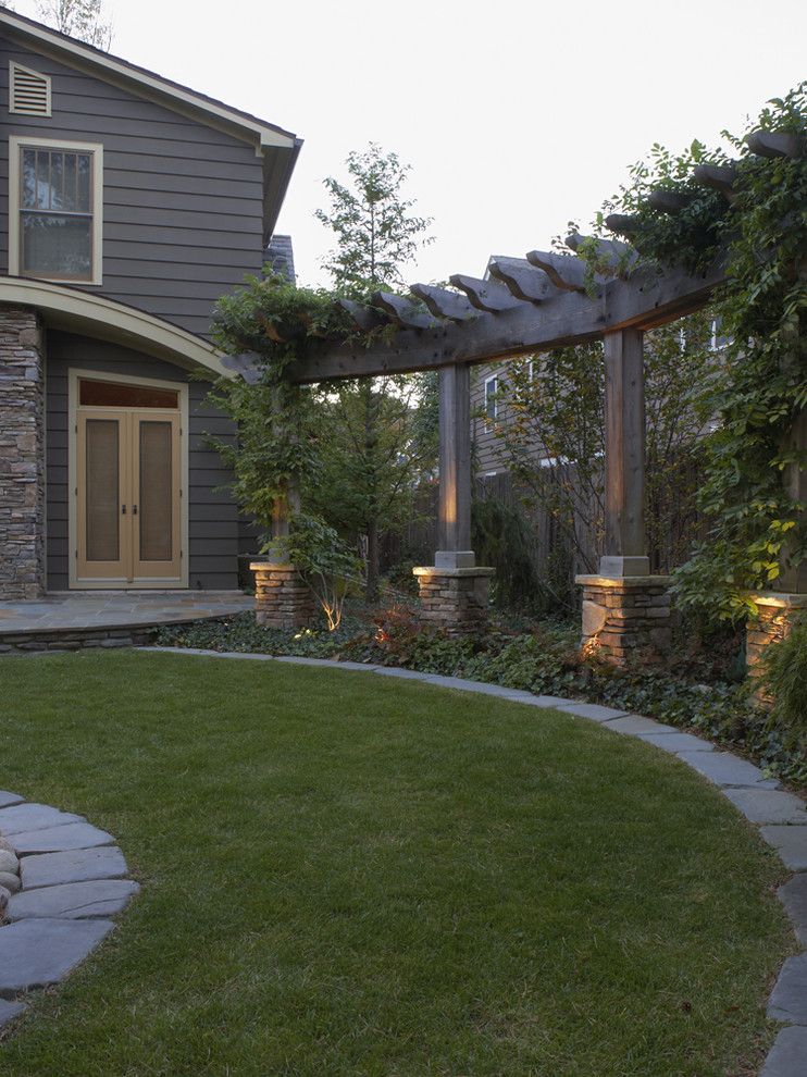 Mossy Oak Fence for a Contemporary Landscape with a Rock Base and Pergolas and Arbors by Great Oaks Landscape Associates Inc.