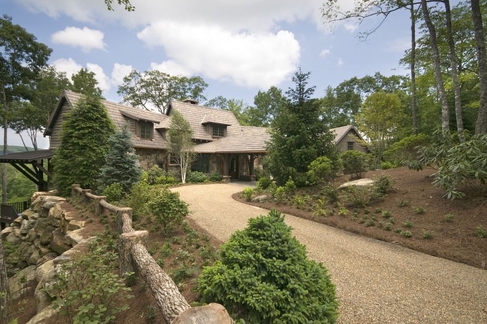 Mossy Oak Fence for a Rustic Exterior with a Entry and Campbell by Summerour Architects