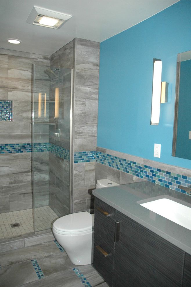 Msi Tile for a Contemporary Bathroom with a Iridescent Tile and Master Bath Blue Glass Mosaic Accent Tile by Kitchen Masters, Inc.