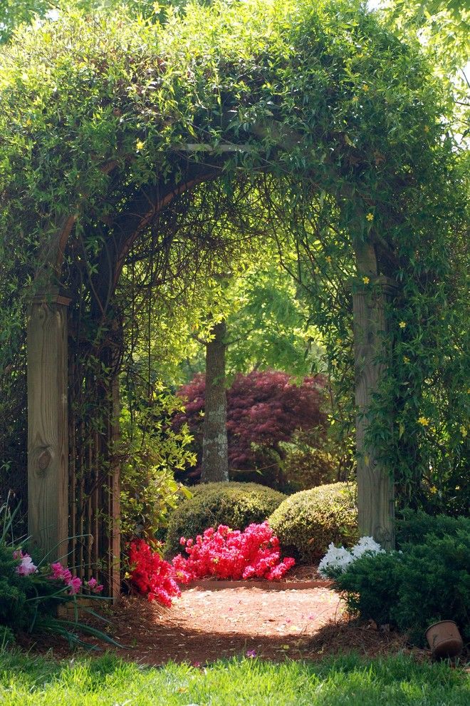 Mulch Masters for a Traditional Landscape with a Arch and Outside Landscape Group by Outside Landscape Group