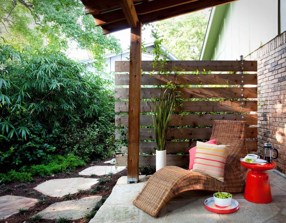 Mulch Masters for a Traditional Patio with a Lush and South Austin Landscape by B. Jane Gardens