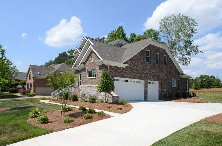 Multigenerational Homes for a Contemporary Exterior with a Custom Home and River Run at Davidson, Nc by Evans Coghill Homes